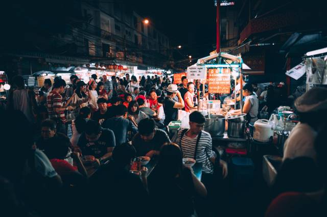 Night market with food stalls in Thailand