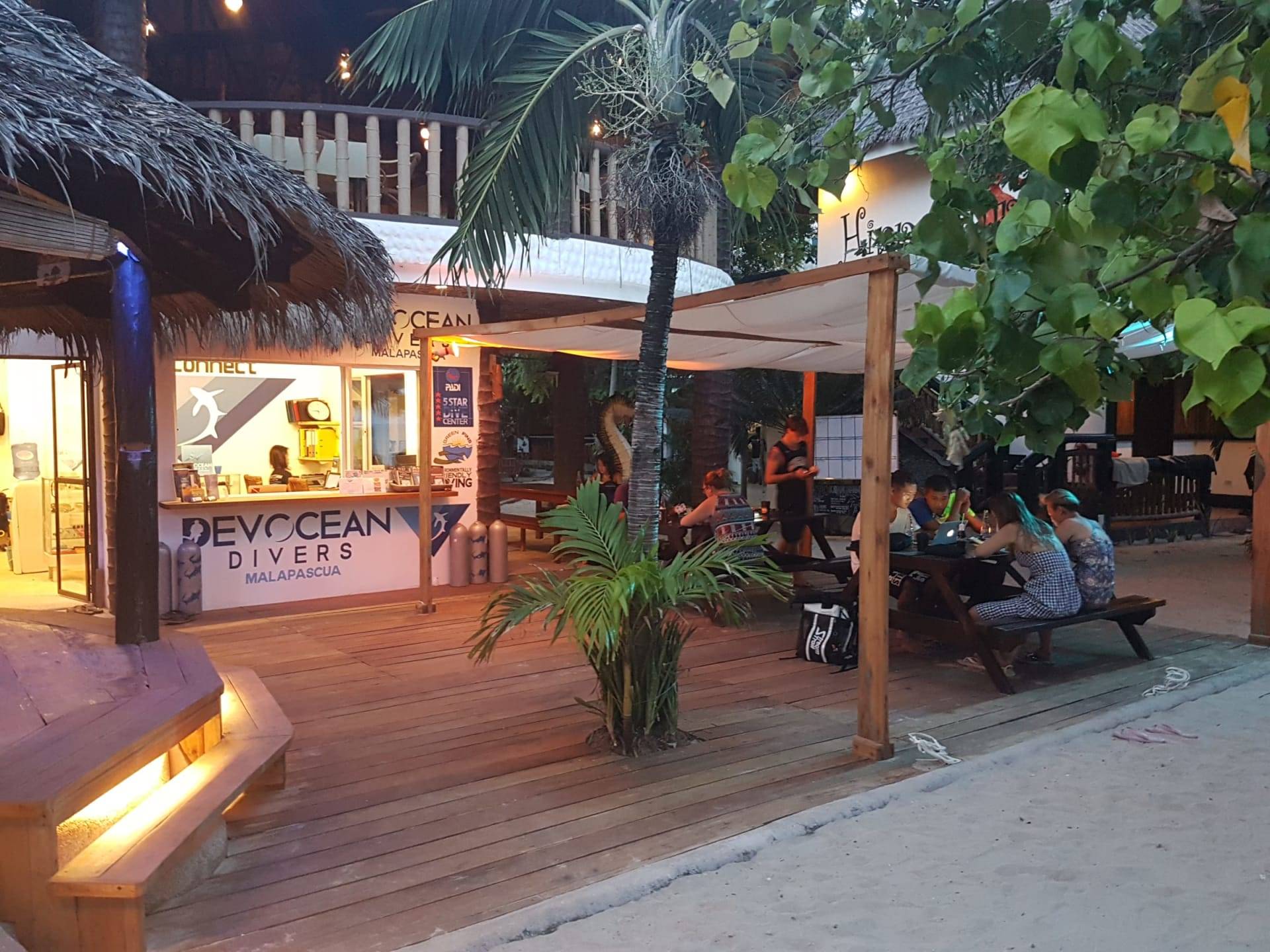 The Devocean Divers dive shop on Bounty Beach in the evening