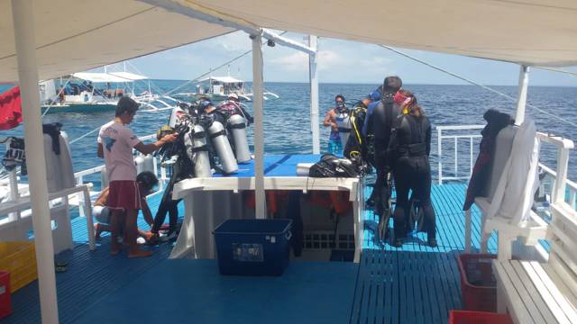 Divers getting ready on the Devocean Divers boat off Malapascua