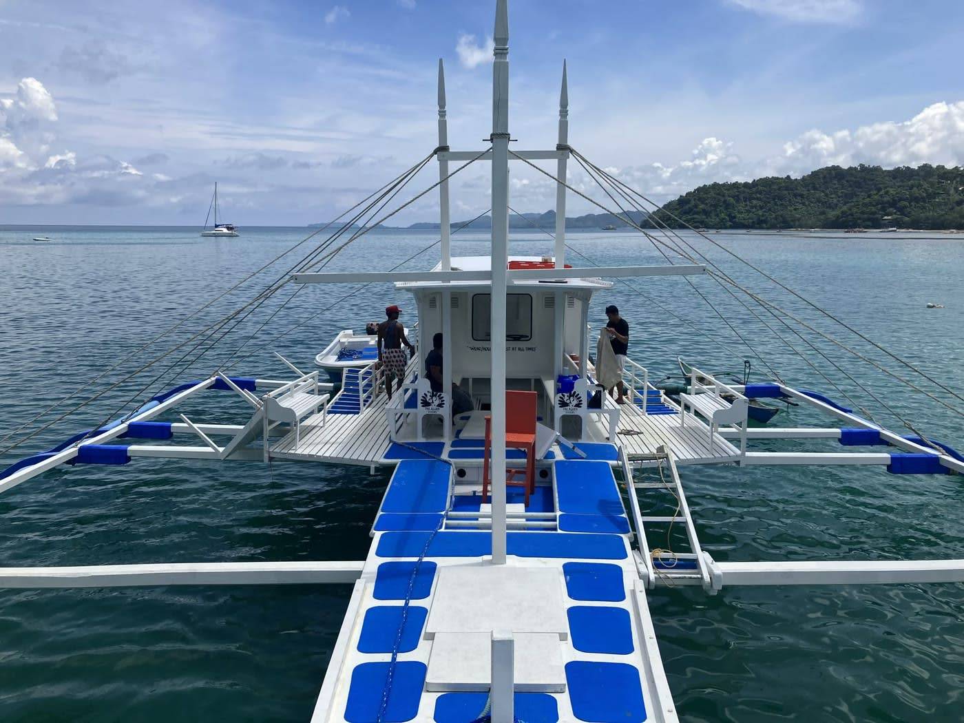 The Palawan Divers dive boat, seen from the bow