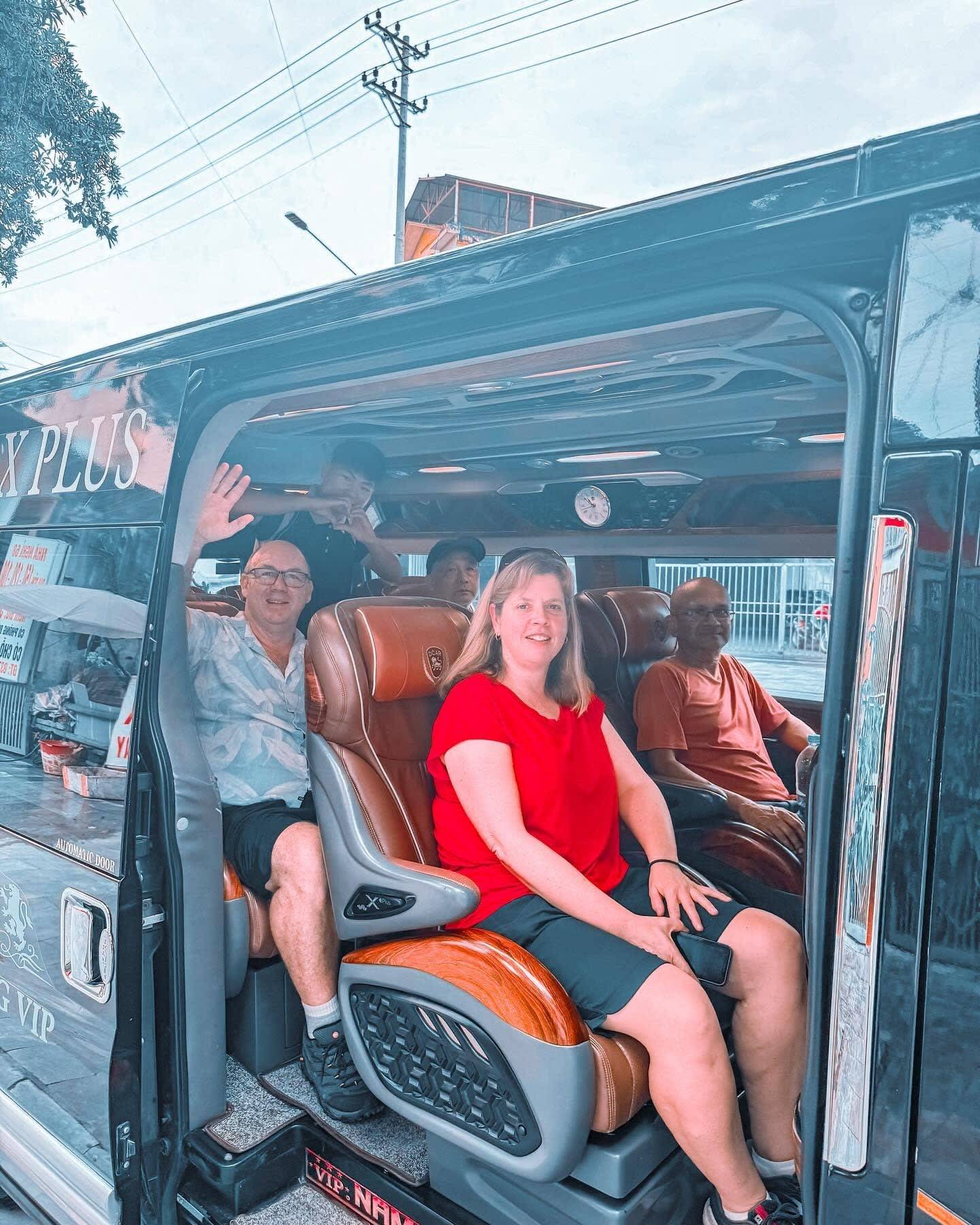 Travellers on the wide-seat bus that Tiem Tours arranges