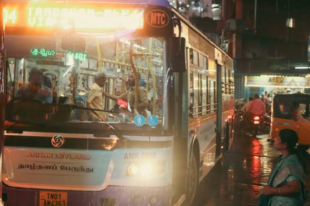Passengers on a bus at night