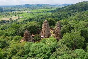 Temple towers between the trees near Battambang