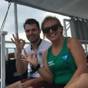 Two divers giving the OK sign on board the dive boat