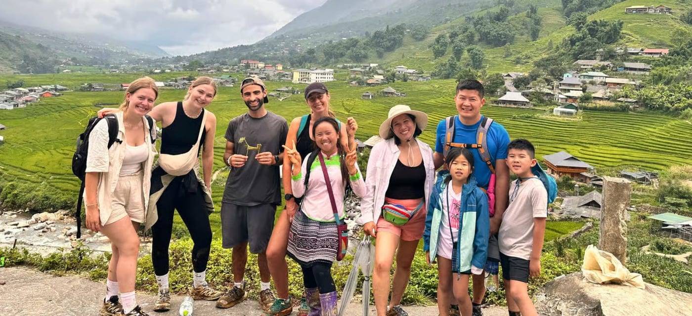 Travellers among the rice terraces of Sapa