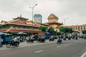 The yellow market hall of Binh Tay Market with Chinese roofs in Cholon