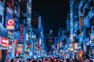Neon lights and crowds on Bui Vien Street in Ho Chi Minh City