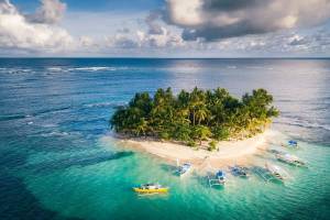 A small palm covered island off Siargao